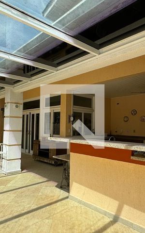 Casa de condomínio à venda com 600m², 4 quartos e 6 vagasChurrasqueira