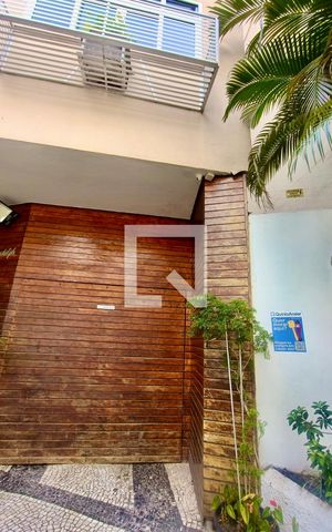 Apartamento para alugar com 90m², 2 quartos e sem vagaFachada com cartaz QA.