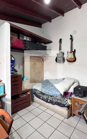 Casa à venda com 250m², 5 quartos e sem vagaSuíte 3 Fundos