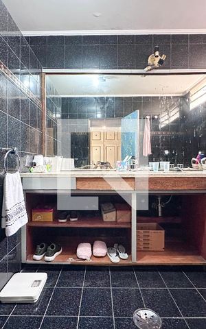 Casa à venda com 250m², 5 quartos e sem vagaBanheiro Suíte 1