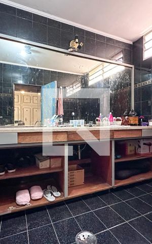 Casa à venda com 250m², 5 quartos e sem vagaBanheiro Suíte 1