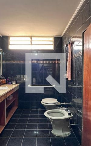 Casa à venda com 250m², 5 quartos e sem vagaBanheiro Suíte 1