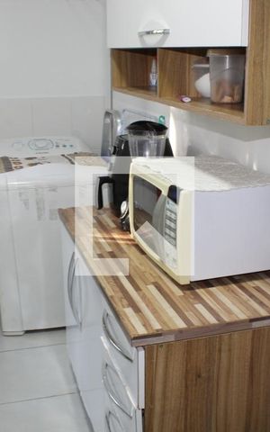 Apartamento para alugar com 48m², 2 quartos e 1 vagaCozinha e Área de Serviço