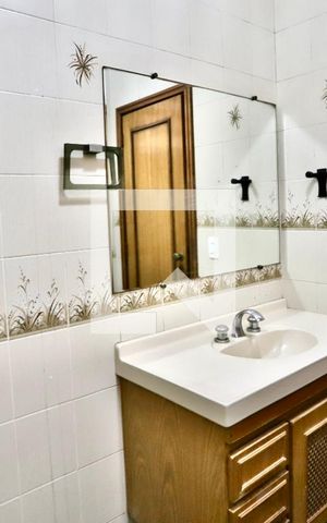 Casa à venda com 293m², 4 quartos e 2 vagas Casa à venda com 293m², 4 quartos e 2 vagasBanheiro 2