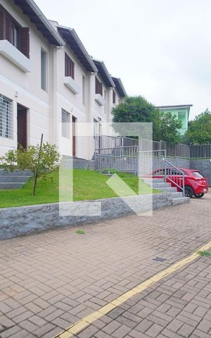 Casa de condomínio para alugar com 59m², 2 quartos e 2 vagas Casa de condomínio para alugar com 59m², 2 quartos e 2 vagasFachada