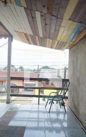 Casa à venda com 180m², 6 quartos e 1 vaga Casa à venda com 180m², 6 quartos e 1 vagaVaranda