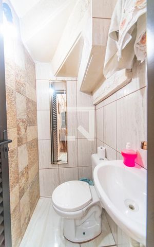 Casa à venda com 156m², 3 quartos e 2 vagas Casa à venda com 156m², 3 quartos e 2 vagasBanheiro da Área Gourmet