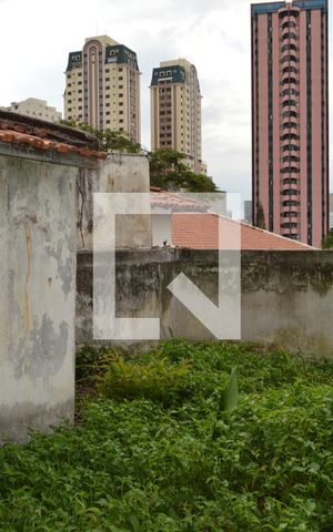 Casa à venda com 423m², 4 quartos e 6 vagasArea externa Fundos
