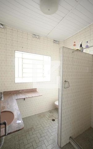 Casa à venda com 276m², 3 quartos e 2 vagasBanheiro