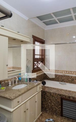 Casa à venda com 700m², 4 quartos e 4 vagasBanheiro da Suíte 4