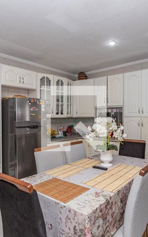 Casa à venda com 45m², 2 quartos e 2 vagas Casa à venda com 45m², 2 quartos e 2 vagasCozinha