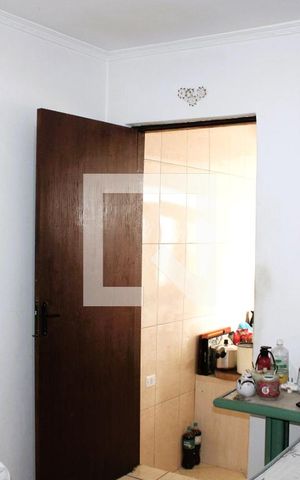 Casa à venda com 200m², 4 quartos e 1 vagaQuarto 1 (Suíte) no piso térreo do sobrado
