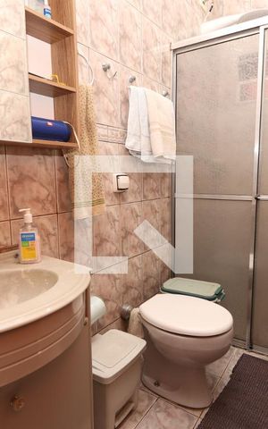Casa à venda com 330m², 4 quartos e 6 vagasBanheiro Casa 1