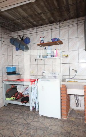 Casa à venda com 330m², 4 quartos e 6 vagasLavanderia Casa 2