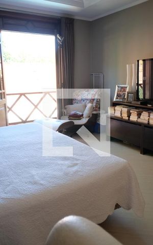 Casa à venda com 450m², 5 quartos e 3 vagasQuarto 3 - Suíte