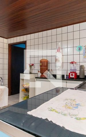 Casa à venda com 70m², 2 quartos e 2 vagas Casa à venda com 70m², 2 quartos e 2 vagasCozinha