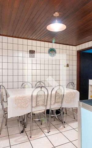 Casa à venda com 70m², 2 quartos e 2 vagas Casa à venda com 70m², 2 quartos e 2 vagasCozinha