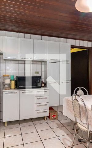 Casa à venda com 70m², 2 quartos e 2 vagas Casa à venda com 70m², 2 quartos e 2 vagasCozinha