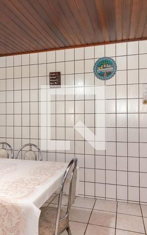 Casa à venda com 70m², 2 quartos e 2 vagas Casa à venda com 70m², 2 quartos e 2 vagasCozinha