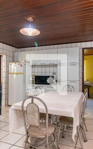 Casa à venda com 70m², 2 quartos e 2 vagas Casa à venda com 70m², 2 quartos e 2 vagasCozinha