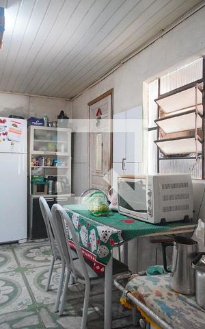 Casa à venda com 120m², 3 quartos e 2 vagas Casa à venda com 120m², 3 quartos e 2 vagasCozinha