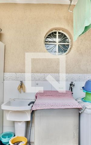 Casa à venda com 170m², 4 quartos e 2 vagas Casa à venda com 170m², 4 quartos e 2 vagasLavanderia 1