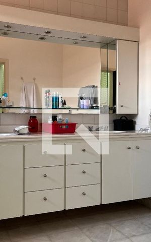 Casa à venda com 460m², 4 quartos e 4 vagasBanheiro 03