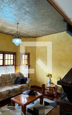 Casa de condomínio à venda com 465m², 4 quartos e 6 vagasSala de estar