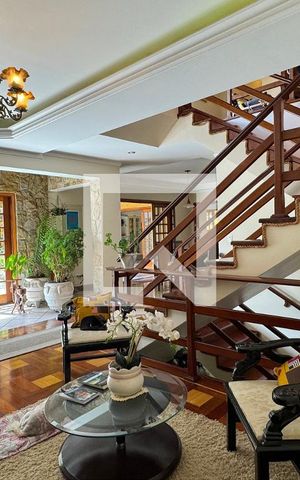 Casa de condomínio à venda com 465m², 4 quartos e 6 vagasSala