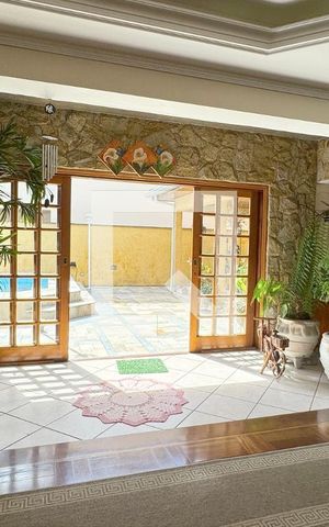 Casa de condomínio à venda com 465m², 4 quartos e 6 vagasSala