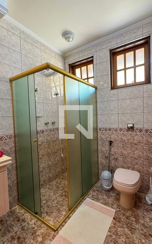 Casa de condomínio à venda com 465m², 4 quartos e 6 vagasBanheiro da Suíte 4