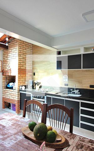Casa de condomínio à venda com 114m², 2 quartos e 1 vagaCozinha e Área de Serviço