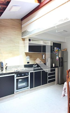 Casa de condomínio à venda com 114m², 2 quartos e 1 vagaCozinha e Área de Serviço
