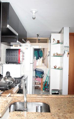 Apartamento à venda com 65m², 2 quartos e 1 vagaCozinha + Área de Serviço