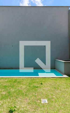 Casa de condomínio à venda com 455m², 4 quartos e 4 vagas Casa de condomínio à venda com 455m², 4 quartos e 4 vagasÁrea Externa