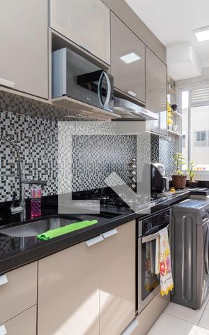 Apartamento à venda com 40m², 2 quartos e sem vaga Apartamento à venda com 40m², 2 quartos e sem vagaCozinha e Área de Serviço