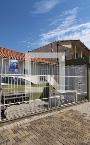 Casa de condomínio à venda com 60m², 2 quartos e 1 vagaFachada