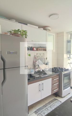 Apartamento à venda com 60m², 2 quartos e 1 vaga Apartamento à venda com 60m², 2 quartos e 1 vagaCozinha e Área de Serviço