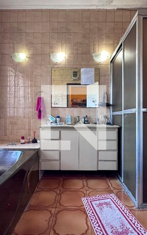 Casa à venda com 405m², 4 quartos e 4 vagasBanheiro Suíte 