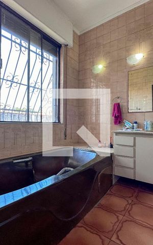 Casa à venda com 405m², 4 quartos e 4 vagasBanheiro Suíte 