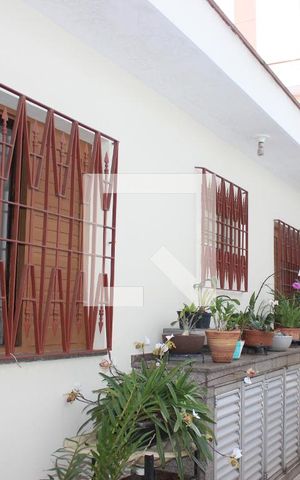 Casa à venda com 112m², 3 quartos e 3 vagasCorredor lateral/ Quintal