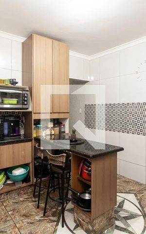Casa à venda com 190m², 4 quartos e 2 vagas Casa à venda com 190m², 4 quartos e 2 vagasCozinha