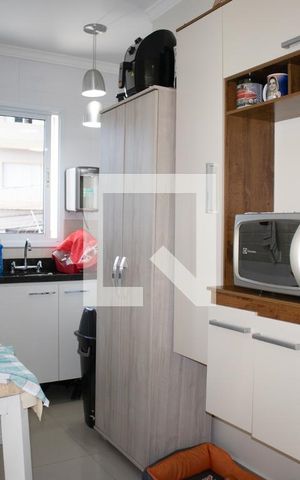 Casa de condomínio à venda com 70m², 2 quartos e sem vagaCozinha e Área de Serviço