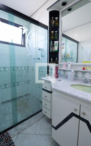 Casa à venda com 331m², 4 quartos e 4 vagasBanheiro Suite 3