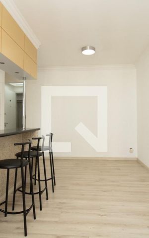 Apartamento à venda com 55m², 2 quartos e 1 vaga Apartamento à venda com 55m², 2 quartos e 1 vagaSala, vista cozinha americana