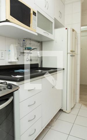 Apartamento à venda com 55m², 2 quartos e 1 vaga Apartamento à venda com 55m², 2 quartos e 1 vagaCozinha, fogão, bancada da pia