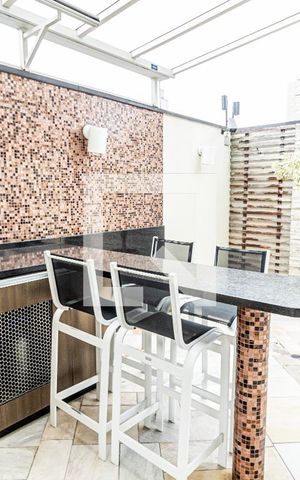 Apartamento à venda com 180m², 4 quartos e 3 vagas Apartamento à venda com 180m², 4 quartos e 3 vagasÁrea comum - Churrasqueira