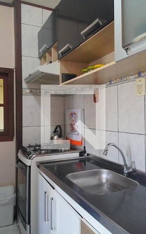 Casa à venda com 82m², 3 quartos e 2 vagas Casa à venda com 82m², 3 quartos e 2 vagasCozinha