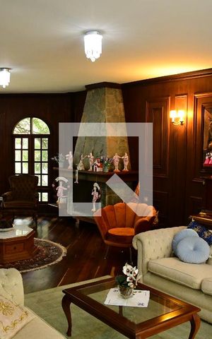 Casa de condomínio para alugar com 1350m², 4 quartos e 7 vagasSala