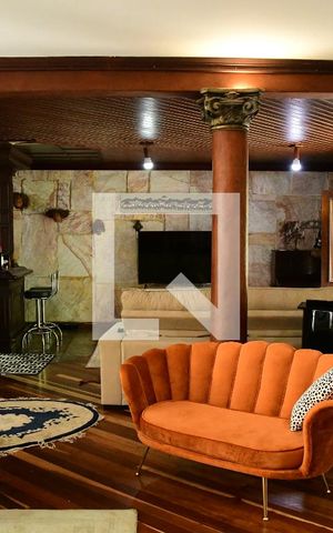 Casa de condomínio para alugar com 1350m², 4 quartos e 7 vagasSala